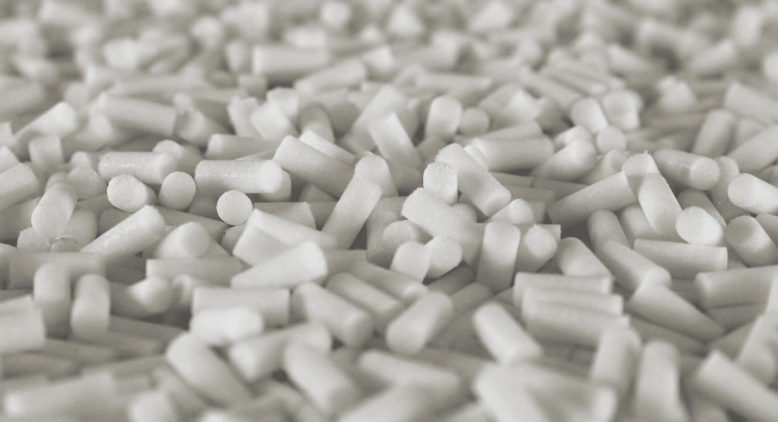 background image of small tubular porous plastic filters